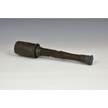 A WWI German stick grenade, of typical form in relic condition, retaining belt clip, deactivated (