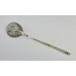 A 19th century Russian silver and niello work caviar spoon, 84 standard, twist handle, the reverse