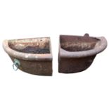 A pair of cast iron corner horse feeders by Parker Winder & Achurch Ltd., one with original bronze