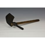 A WWI 1915 British Army issue entrenching tool, stamped to wooden handle with broad arrow and