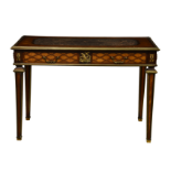 A fine Louis XVI mahogany, satinwood, ebony and ormolu table à écrire in the manner of Jean-Henri