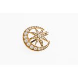 An antique 18ct gold and seed pearl star and moon brooch, set with graduated half pearls, 21mm.