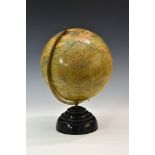 A 1920's 'Geographia' 10 inch Terrestrial Globe, raised on stepped circular bakelite base.