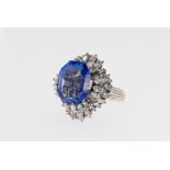 An impressive sapphire and diamond ballerina ring, featuring an octagonal cut cornflower blue