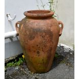 A large floor standing terracotta olive oil style pot, of typical form with twin loop handles, 28in.