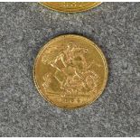 An Edwardian 1904 gold half sovereign,