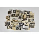 A collection of original World War Two German photographs and postcards, to include troops, soldiers