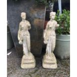 Two small composite stone classical maiden water carrier statues, nicely weathered, each carrying