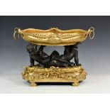 A French 18th century style gilt and patinated bronze centrepiece, late 20th century, the boat