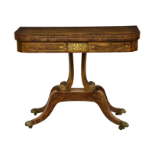 A George IV rosewood, coromandel and brass D-shaped card table, in the manner of William Trotter