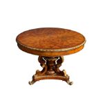 A George III style mahogany, satinwood and parcel gilt centre table, late 20th century, the circular
