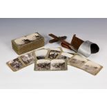 A Underwood & Underwood stereoscopic viewer and 47 WWI slides, published by Realistic Travels.