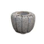 A grey granite garden planter / jardinière, of gadrooned bulbous form, 14in. (35.5cm.) high,