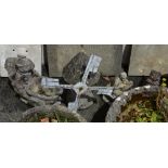 A small collection of composite stone garden ornaments, comprising of a windmill, 24in. (61cm.)