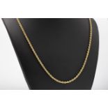 A 9ct yellow gold rope chain necklace and bracelet, the necklace 20in. (50.75cm.) long, the bracelet