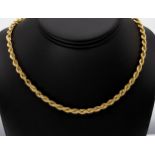 A 9ct gold rope twist chain, the chain measuring approximately 62cm in length.