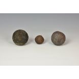 An English civil war exploding iron mortar / cannon ball, with pierced hole for fuse and shrapnel,