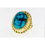 A 14ct gold and turquoise ring, featuring a large oval turquoise measuring approximately 19x15mm and