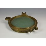 Maritime interest - A cast polished brass nautical ships window / porthole cover, of typical form