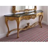 An impressive Louis XV style giltwood and marble console table, mid-20th century, of substantial