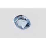 A loose fancy cut blue topaz, measuring approximately 9x7mm.