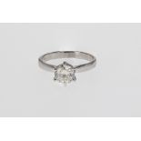 A 14ct white gold and diamond solitaire, featuring a round brilliant cut diamond weighing