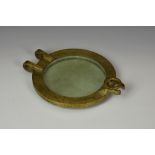 Maritime interest - A cast polished brass nautical ships window / porthole cover, of typical form