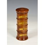 An early 19th century treen spice tower, four tier, the screw sections with labels for GINGER;