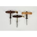 Three Henshall style direct pull corkscrews, 19th century, two with turned wooden handles and brush,
