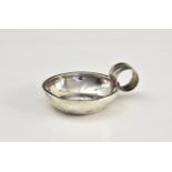 A French silver tastevin, Cesar Tonnelier, Paris, 1845-1882, of small proportions, plain form with