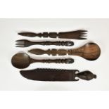 Tribal Art - a collection of carved African implements, to include a spoon and fork with carved