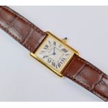 A gentleman's Cartier 18ct yellow gold Tank Louis wrist watch, ref. 2441, signed silvered dial with