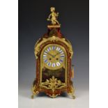 A 19th century French Boulle mantel clock by Japy Freres, with gilt metal floral mounts and