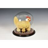 An unusual Victorian novelty - a woolwork chicken and five chicks under glass dome, the chicken with