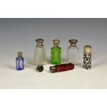 Six silver mounted cut glass scent bottles, 19th & early 20th century, including a Victorian