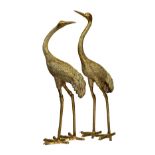 A pair of extremely large Thai brass sculptures of cranes, 20th century, the taller 69¼in. (175.