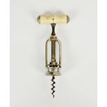 A French twin pillar single action L'Excelsior corkscrew, nickel plated brass with turned bone