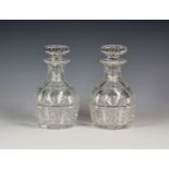 A pair of vintage Stuart cut glass decanters, having ringed neck, slice cut and cross hatch