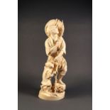A Japanese carved ivory figure of a spear fisherman, with a coolie hat at his shoulders, a child