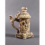 A small South German carved ivory lidded tankard, probably early 19th century, in the Renaissance