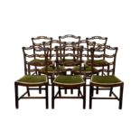 A set of eight mahogany Chippendale style pierced ladder back dining chairs, 20th century, the