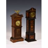 Two late 19th century miniature longcase mantel clocks, probably German, one with architectural