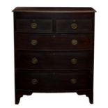 A George III mahogany veneered bow front chest of drawers, the moulded top over two short and