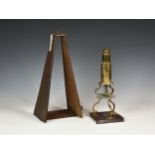 An early 19th century English brass Culpepper type microscope, with assorted accessories and