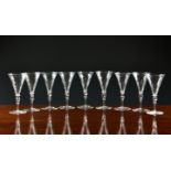 A set of nine wrythen bowl port or sherry glasses, first half 20th century, 12.4cm. high. (9)