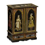 An Indian painted cabinet form table box, the top with four seated figures and floral border over