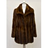 A Pandora mink short jacket, in glow colour, with boat neck collar, flared sleeves, two hook