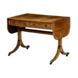 A good late-Regency rosewood sofa table, the well figured rectangular top with satinwood cross