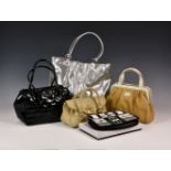 Five Lulu Guinness bags, to include a boxed evening bag with shop front design, a quilted black