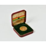 A cased Ghana 1960 Republic Day Two Pound Gold coin, 16 grammes in box of issue, no paperwork.